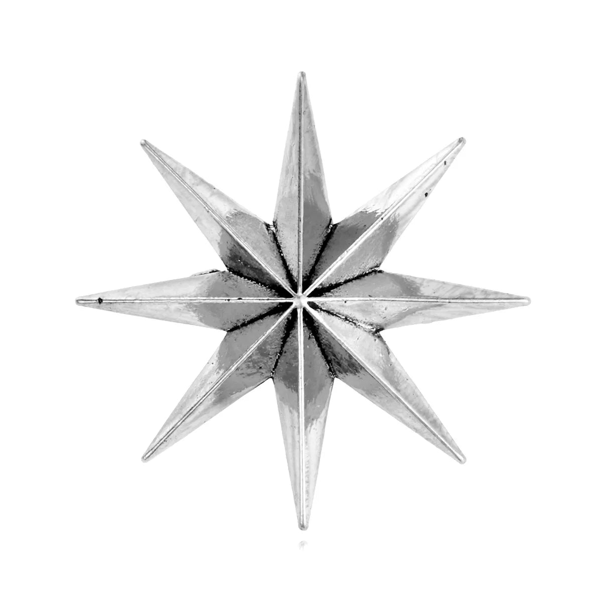 Silver metallic star brooch pin on white background