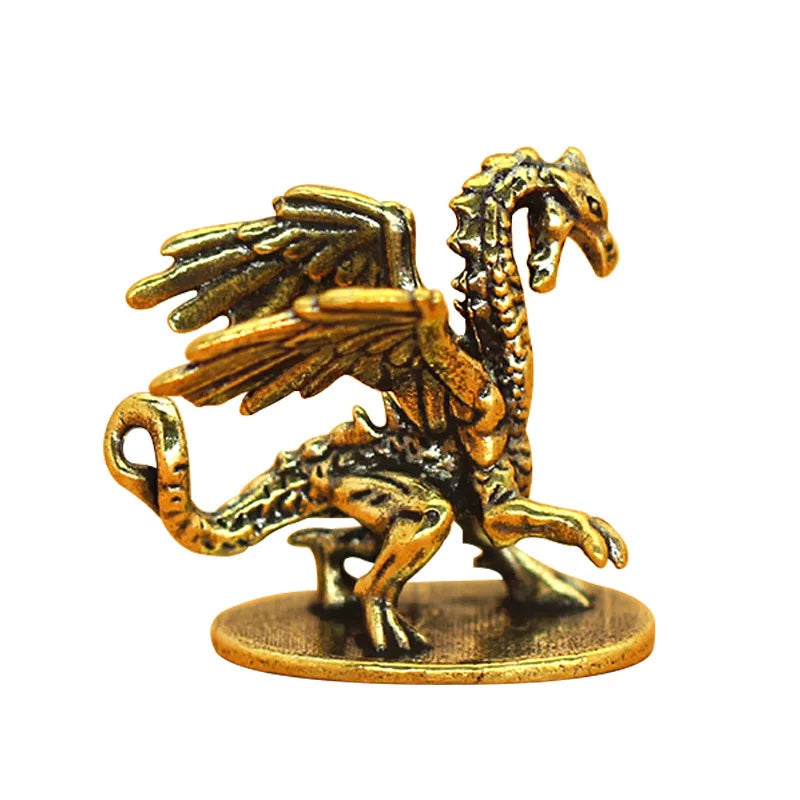 Bronze dragon figurine on a white background