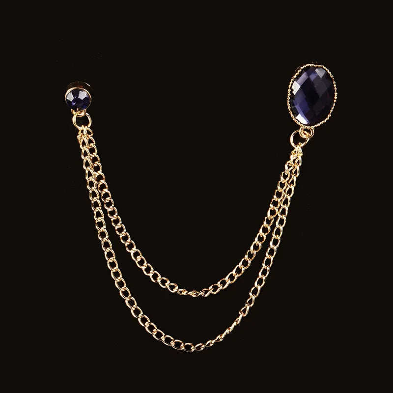 Gold chain brooch with blue gemstone luxury lapel jewelry