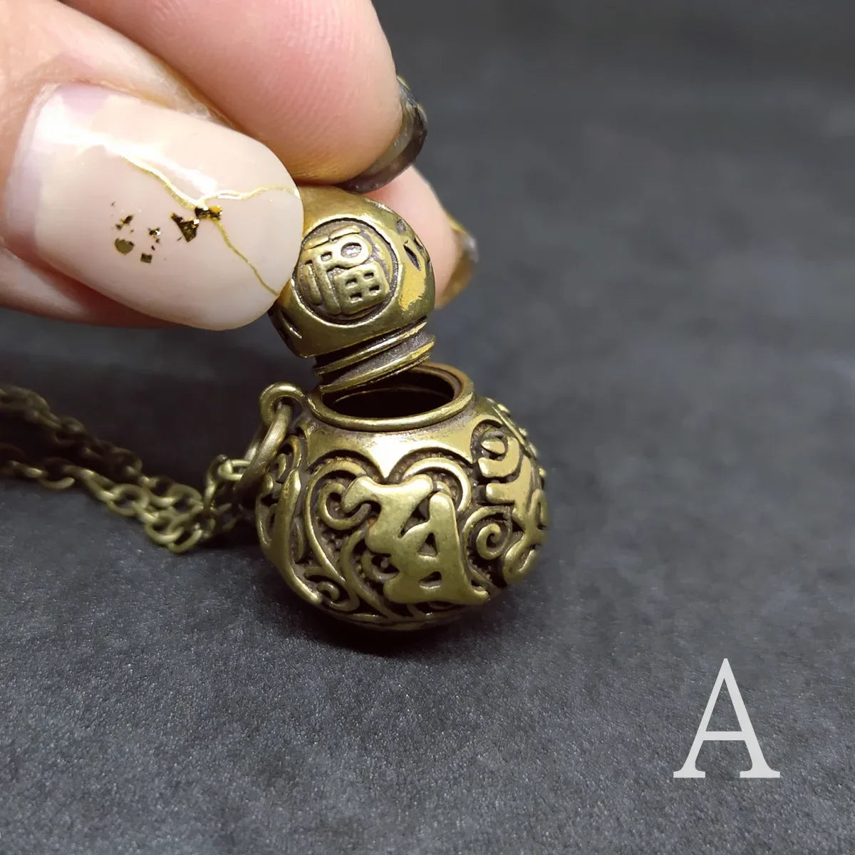 Copper alloy gourd locket pendant with detailed vintage floral engraving