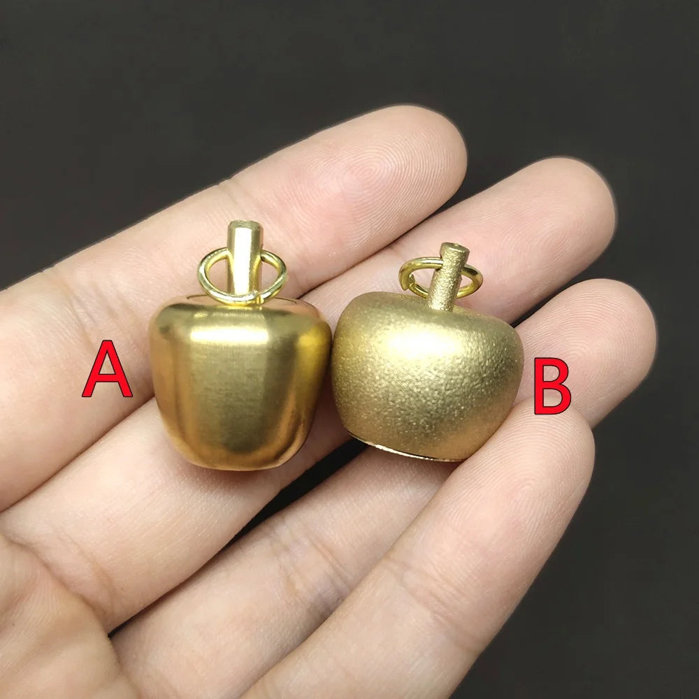 Two brass apple urn pendant styles A and B with smooth and frosted surface finishes