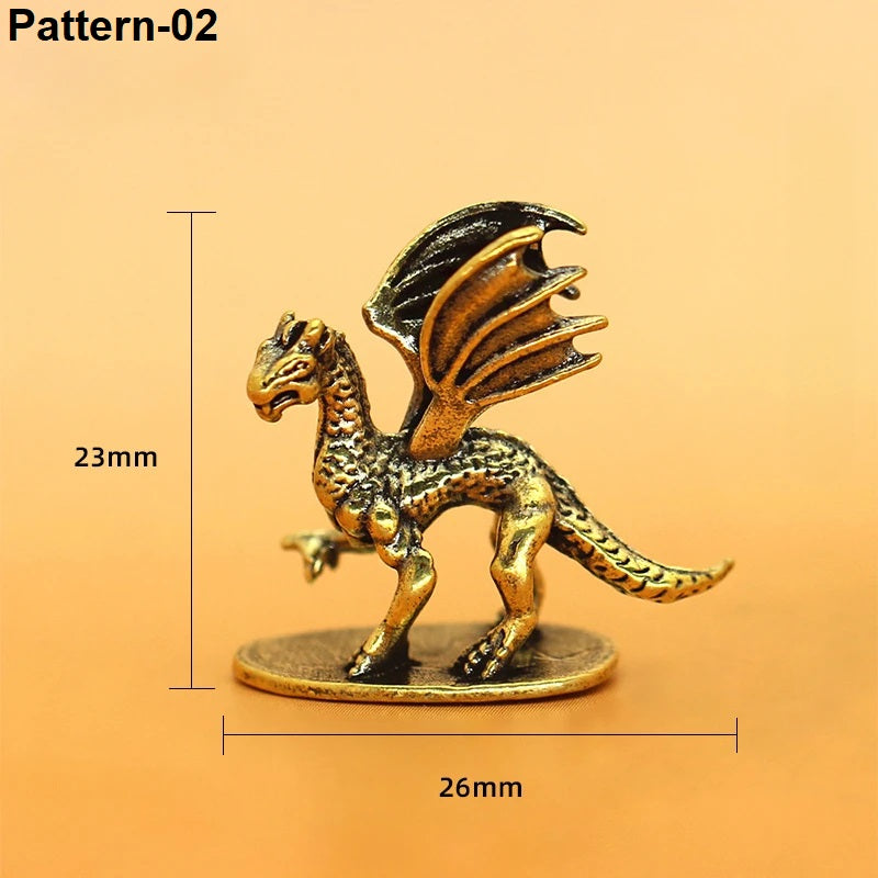 A small metallic dragon figurine on a round base, shown with dimension lines and labels reading 23mm height and 26mm width on a warm beige background. The text 'Pattern-02' appears at the top left.