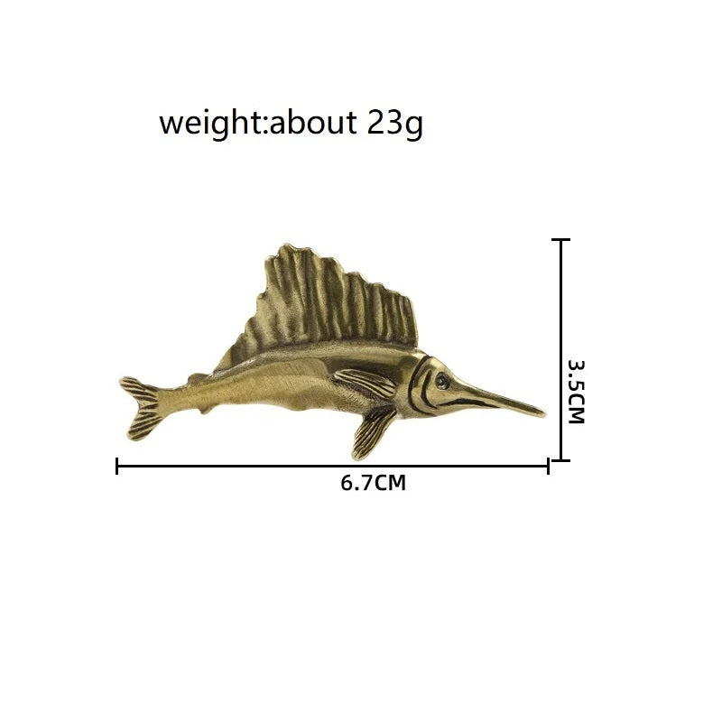 Size chart of solid brass sailfish figurine showing 6.7 cm × 3.5 cm dimensions