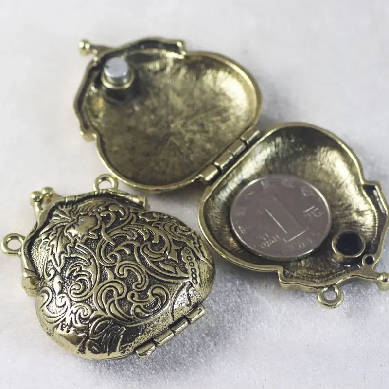 Bronze decorative locket with intricate patterns on a white background