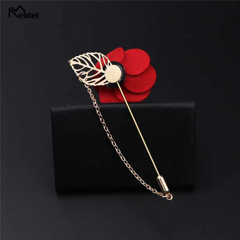 Back side view of red rose brooch showing pin hook and fastening mechanism detail
