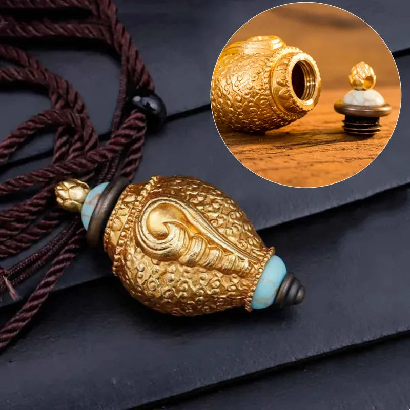 Vintage conch shell urn pendant with intricate engraved details and hidden storage compartment necklace