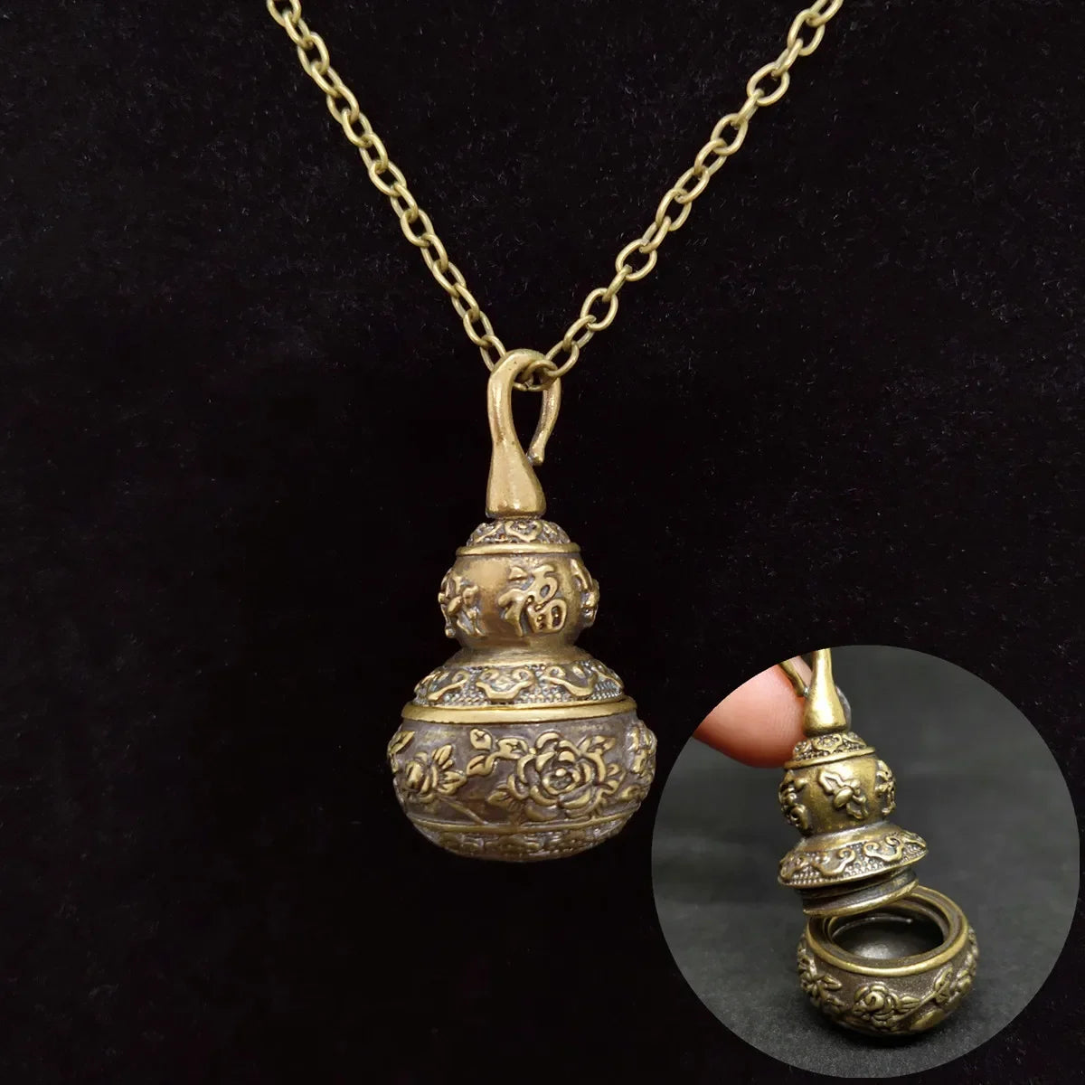 Antique copper alloy gourd urn pendant necklace featuring secret storage compartment and vintage floral engraving