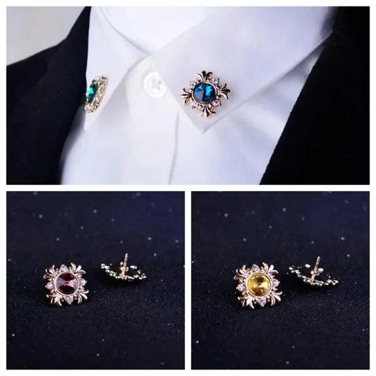 Elegant gemstone brooch accessory styled on formal cuff shirt luxury gold tone fashion jewelry on dark background
