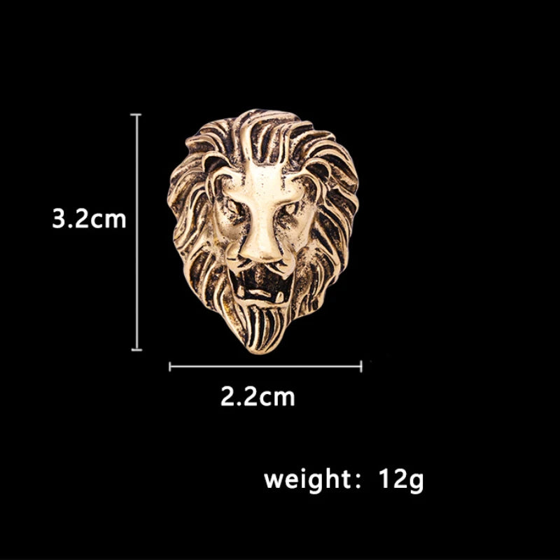Bronze lion head pendant with measurements and weight on a black background