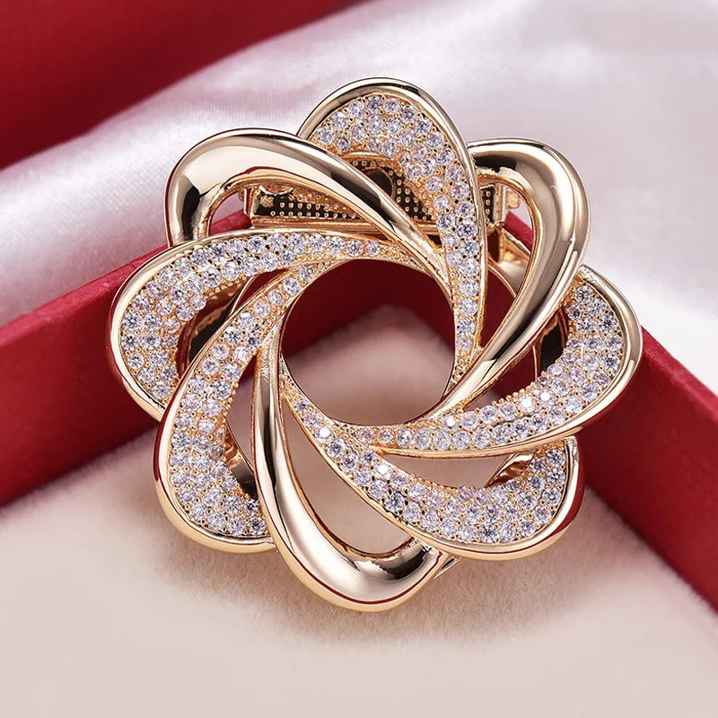 Gold and diamond brooch luxury fashion jewelry accessory on red and beige fabric background