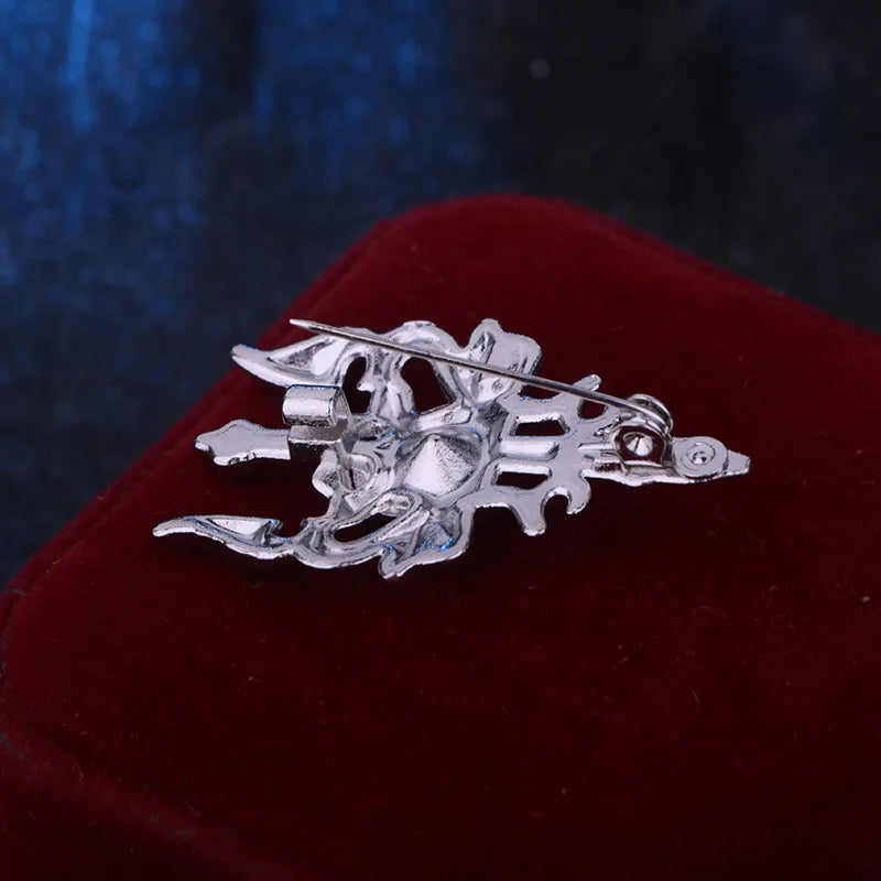 Back side view of dragon brooch pin with secure clasp detail