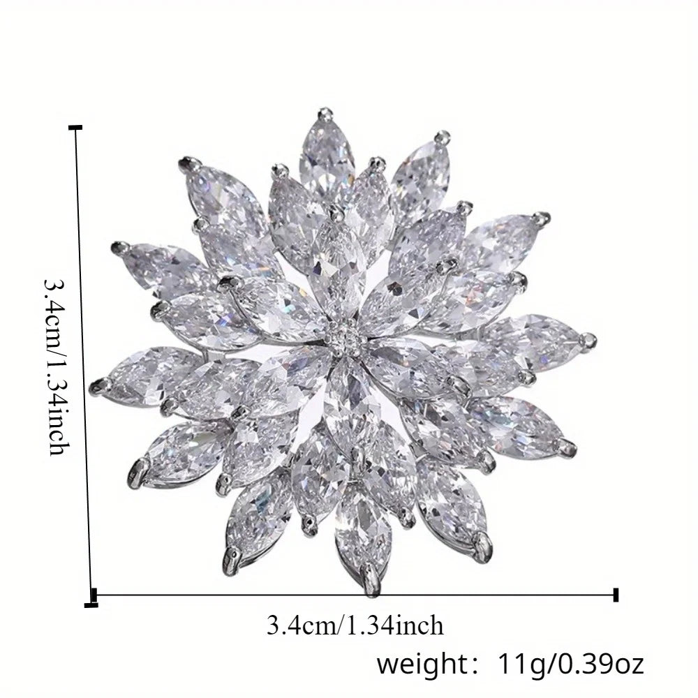 Crystal flower brooch with measurements and weight on a white background