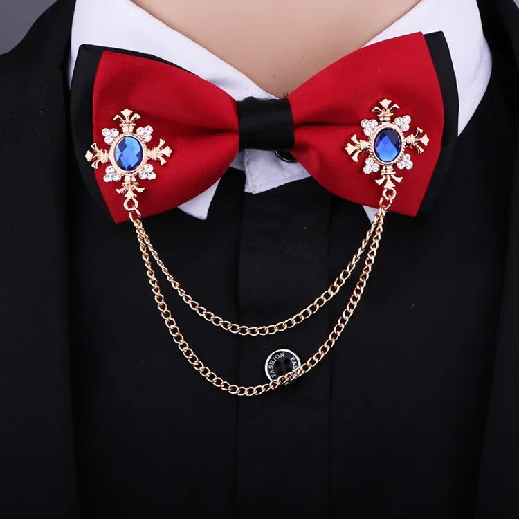 Crystal cross chain brooch styled with a formal shirt and bow tie.