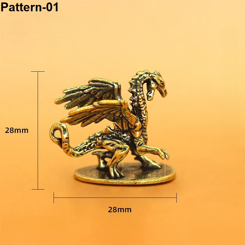 A small metallic griffin figurine on a round base, shown against a warm orange background with dimension lines labeled 28mm height and 28mm width. The text 'Pattern-01' appears in the top left.