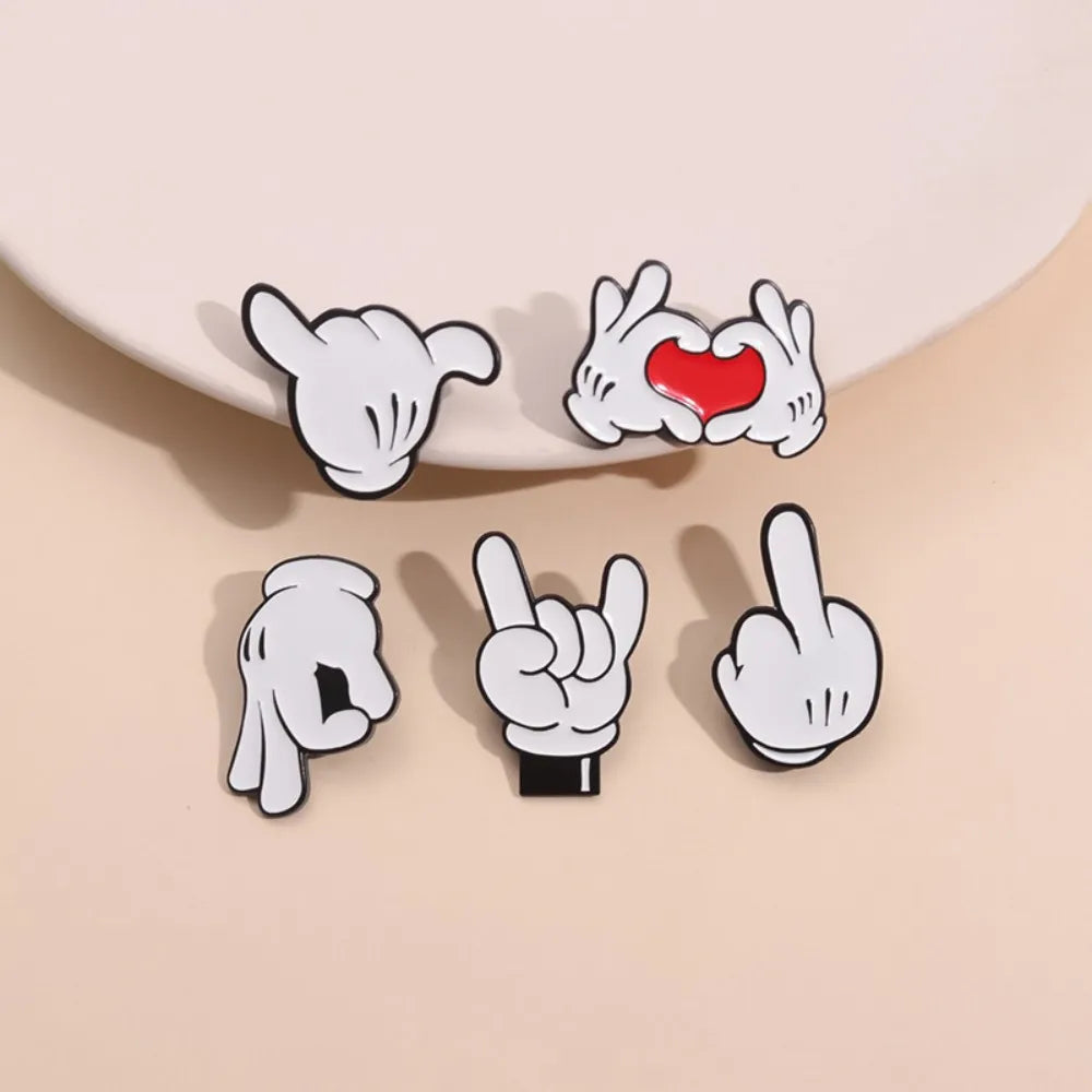 Trendy cartoon finger gesture brooch set on beige background