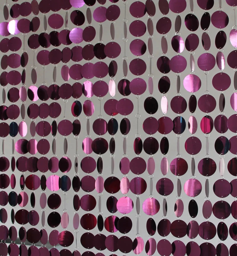 Close-up of a purple and pink circular patterned sequin 