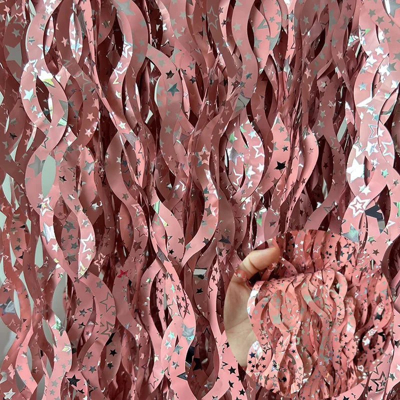 Pink star foil fringe curtain strip for birthday decorations and festive party setups