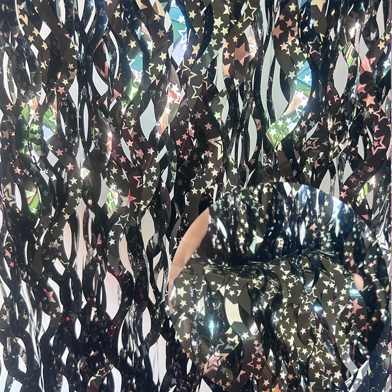 Holographic star themed foil backdrop curtain with reflective metallic finish