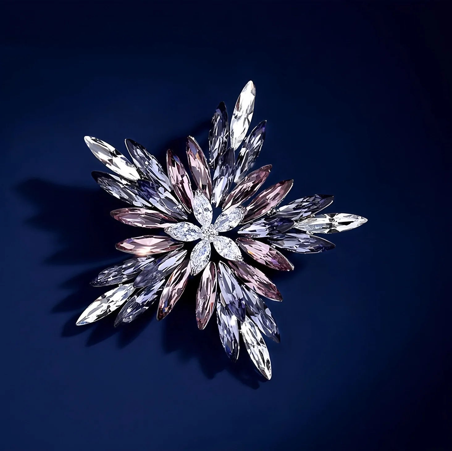 Sparkling star design crystal brooch on elegant dark blue background