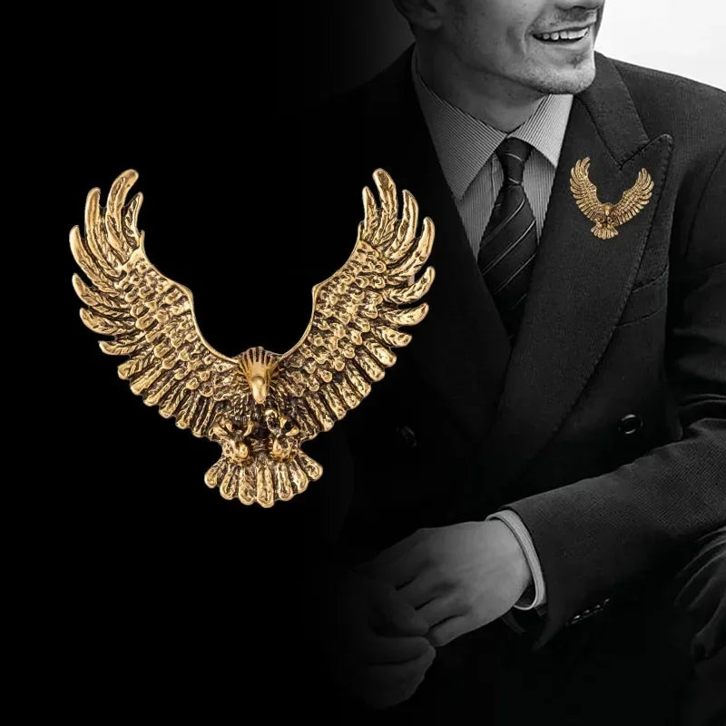 Man wearing black suit with luxury eagle brooch lapel accessory