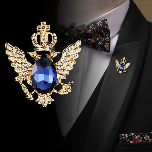 Man in black suit with decorative brooch lapel pin and bow tie formal fashion style
