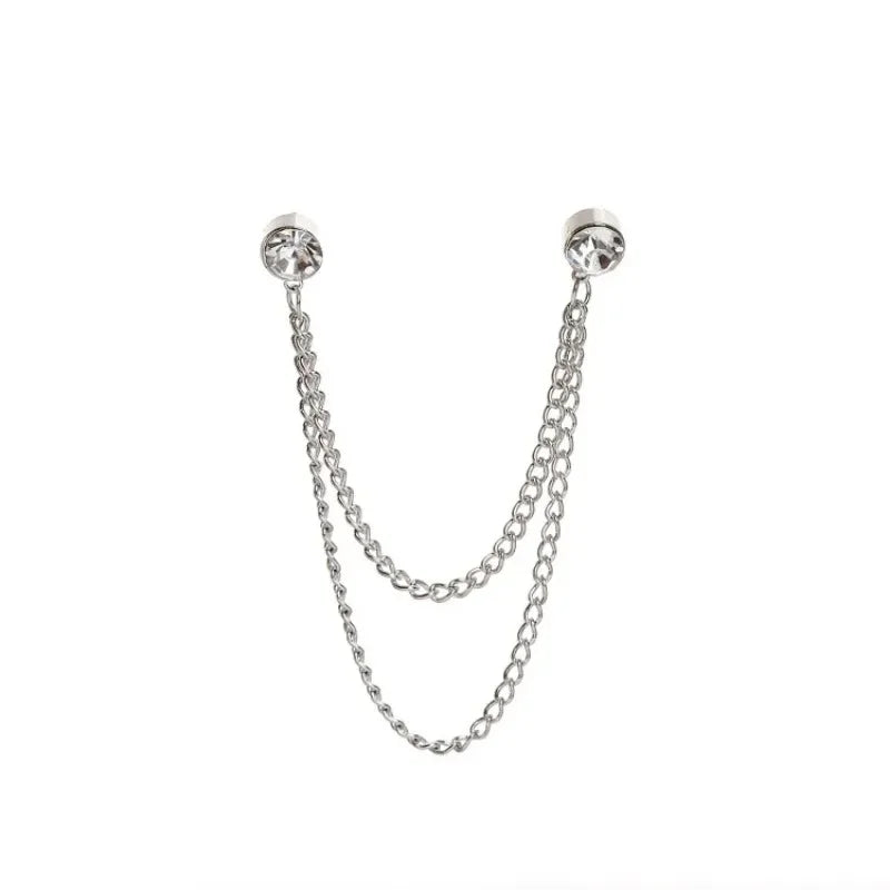 Minimal silver chain lapel pin on white background