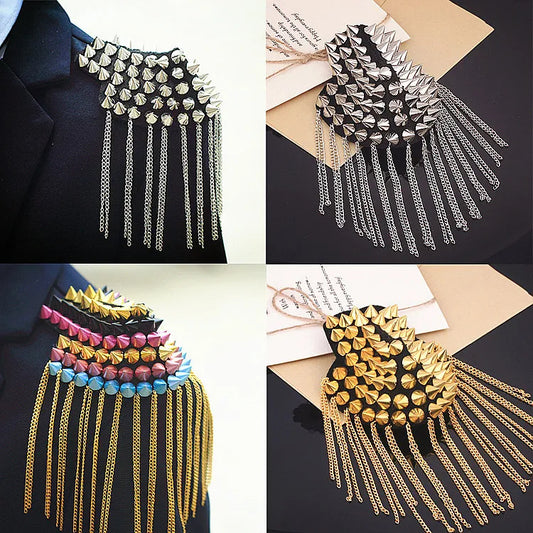 Collage of vintage tassel chain shoulder brooch pins on dark background