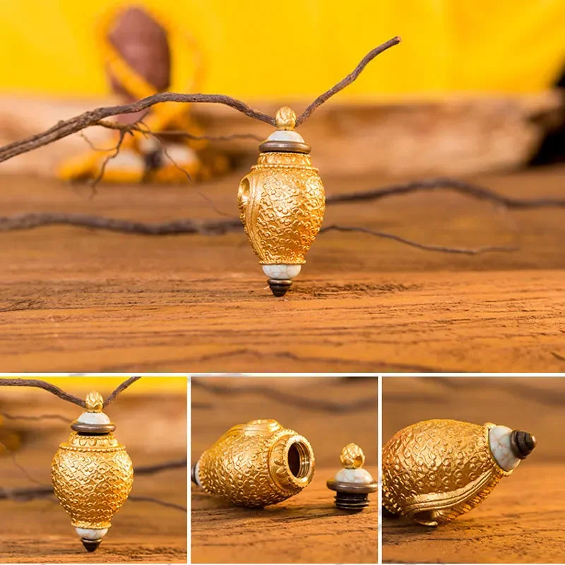 Decorative brass conch urn pendant displayed on wooden surface with detailed engraved finish