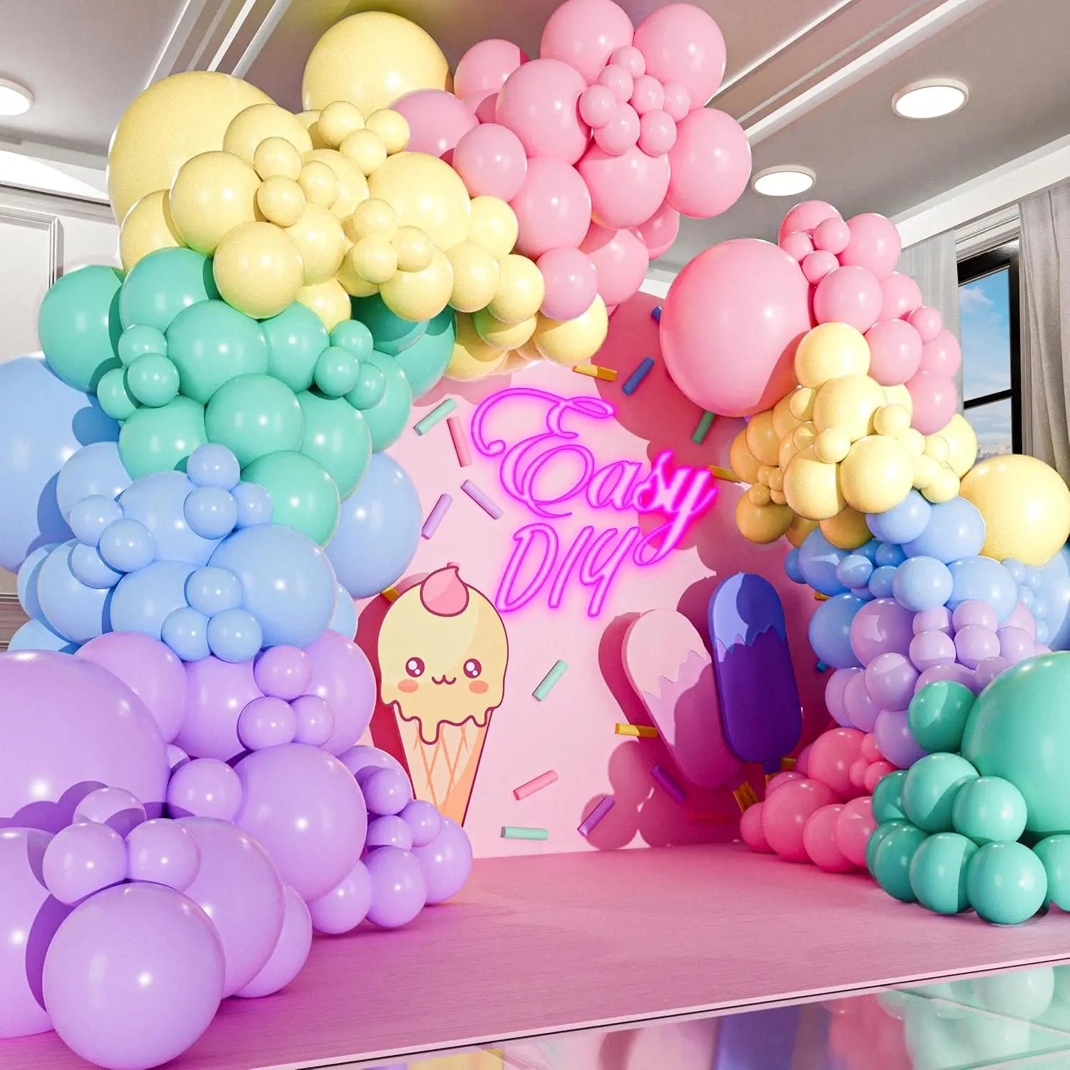 Colorful balloon arch with a 'Easy DIY' sign featuring ice cream graphics.