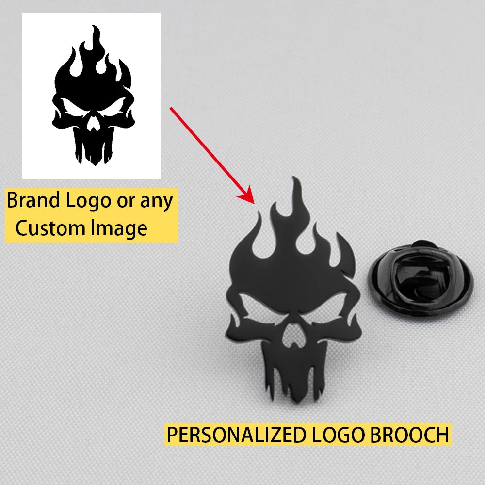 Black personalized logo brooch with skull design on a gray background