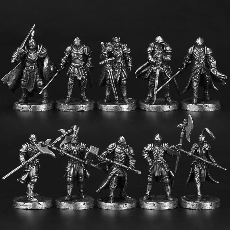 Set of metallic warrior figurines on a dark background