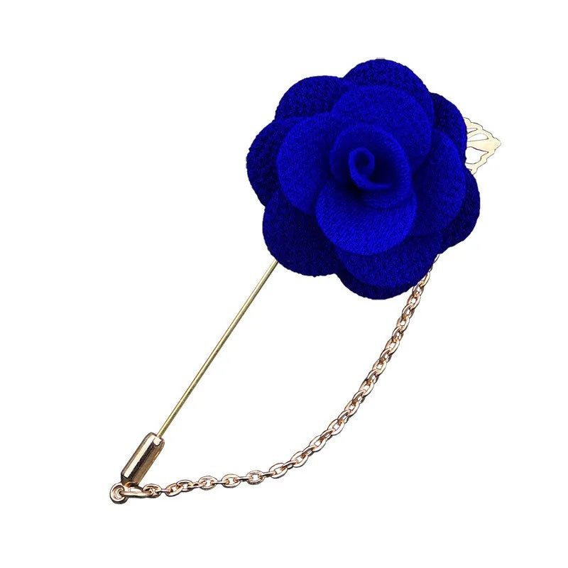 Blue flower shaped brooch with chain elegant fashion jewelry accessory on white background