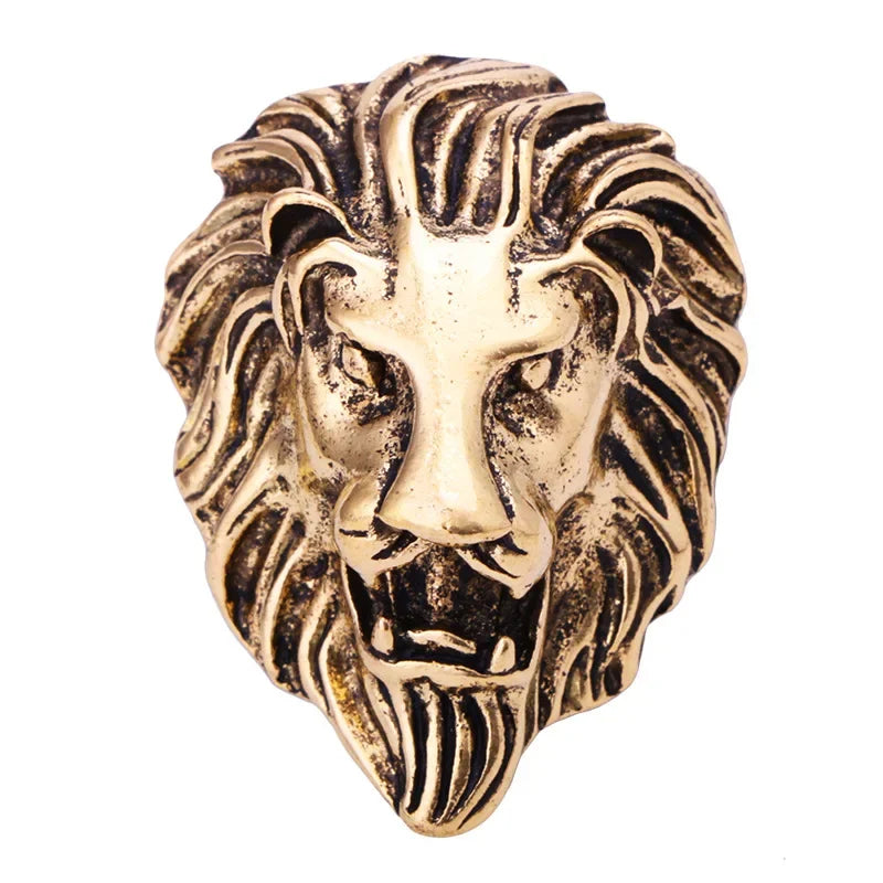Bronze lion head sculpture on a white background