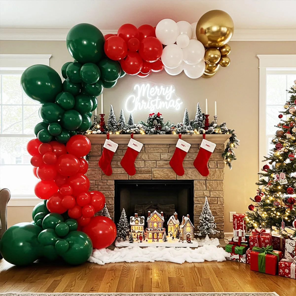 Decorated Christmas living room with balloons, stockings, and a fireplace.