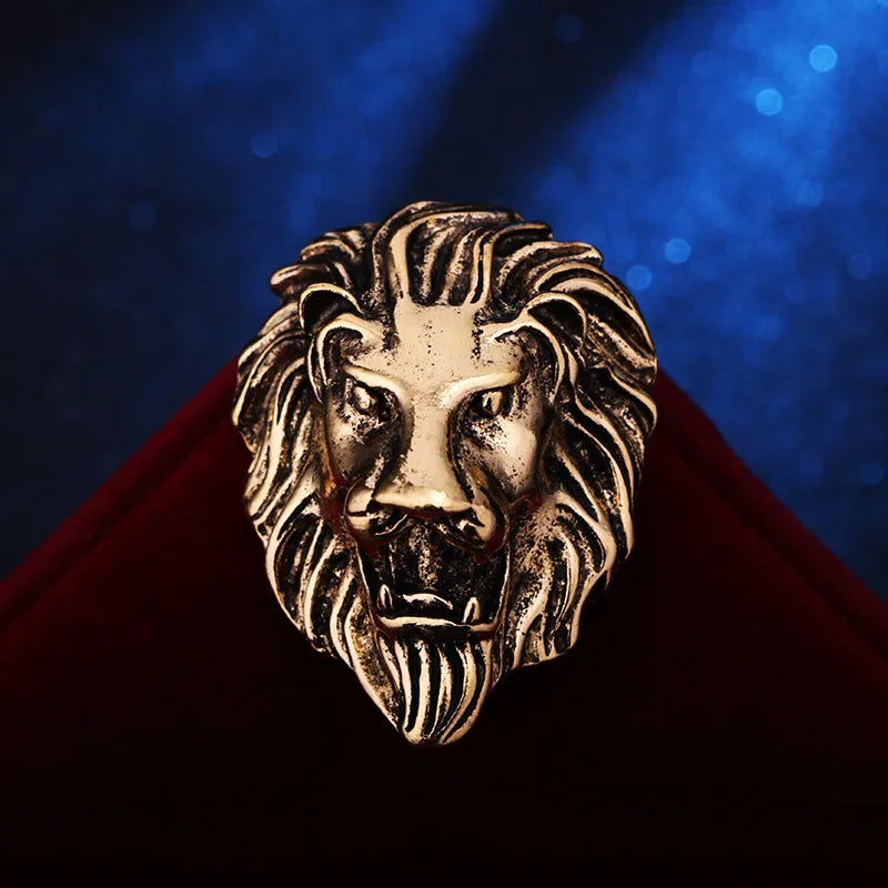Bronze lion head on a red and blue gradient background