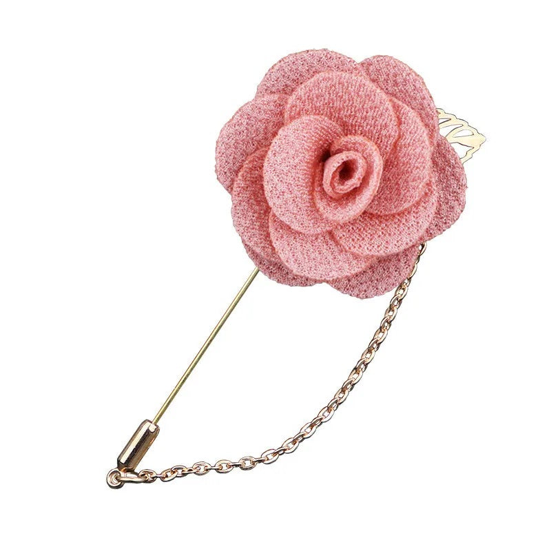 Pink flower shaped brooch with chain elegant fashion jewelry accessory on white background