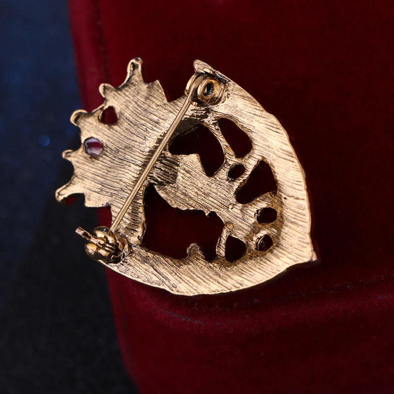 Luxury lion emblem brooch with vintage crystal detailing