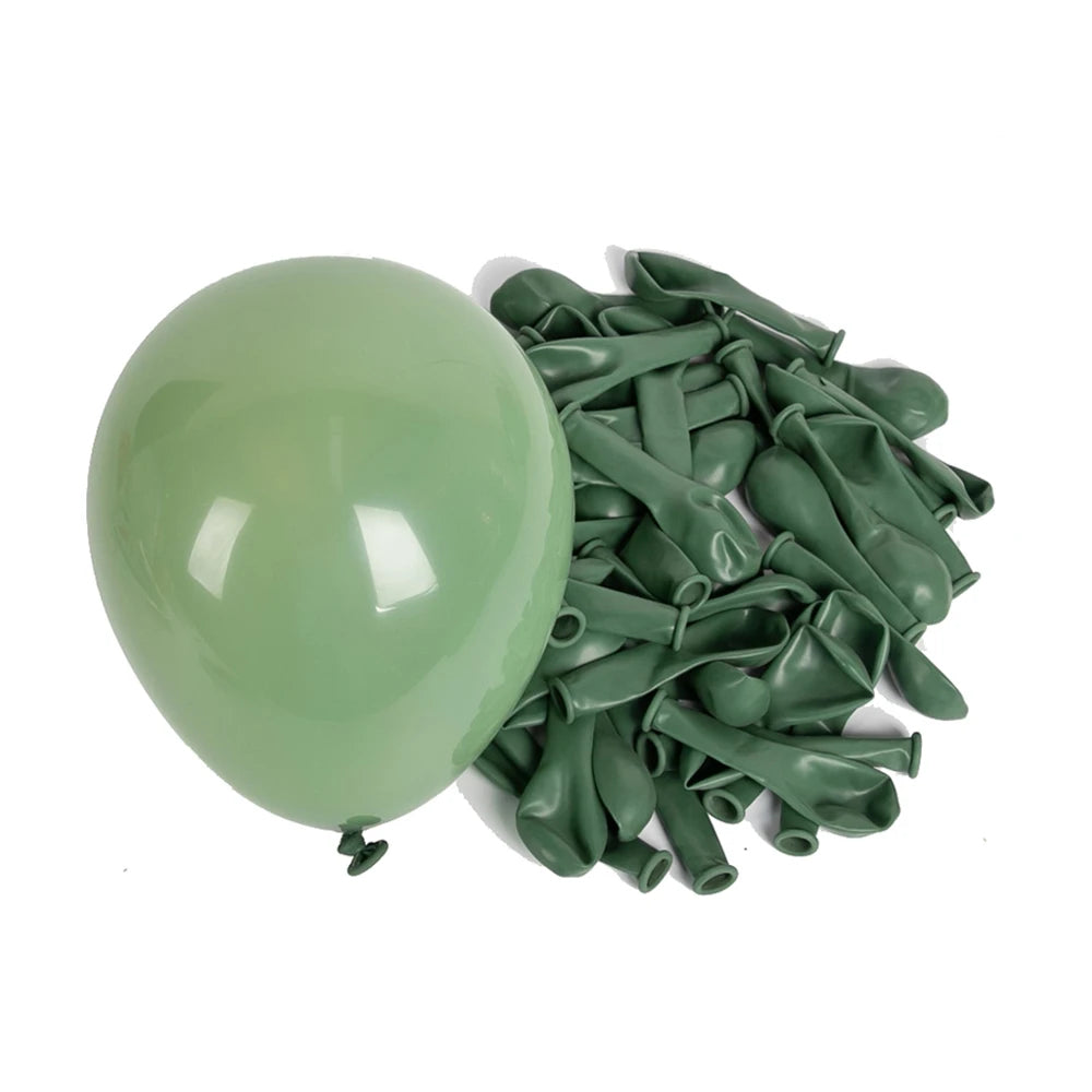 A light green latex balloon next to a pile of deflated green balloons on a white background.