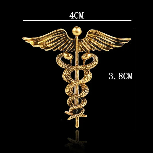 Gold caduceus symbol with measurements on a black background