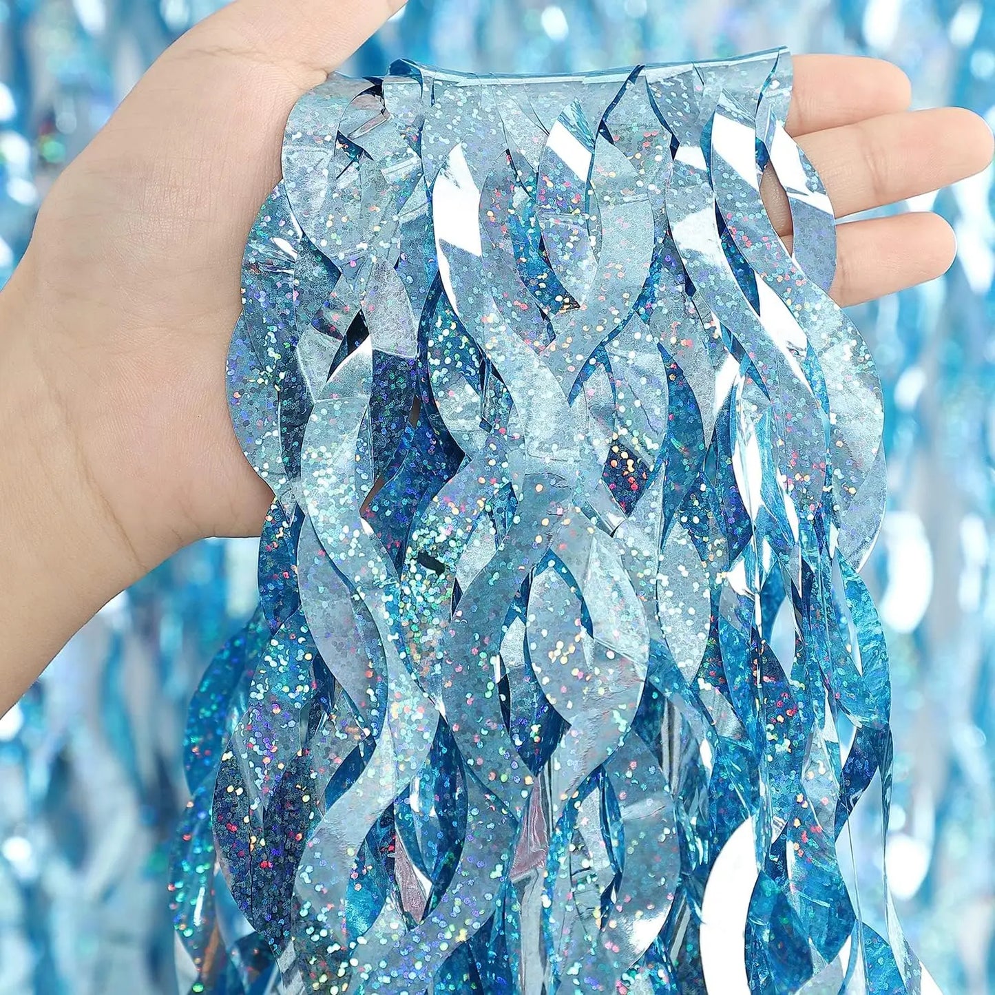Blue shimmer foil fringe curtain strip with reflective finish for party backdrops