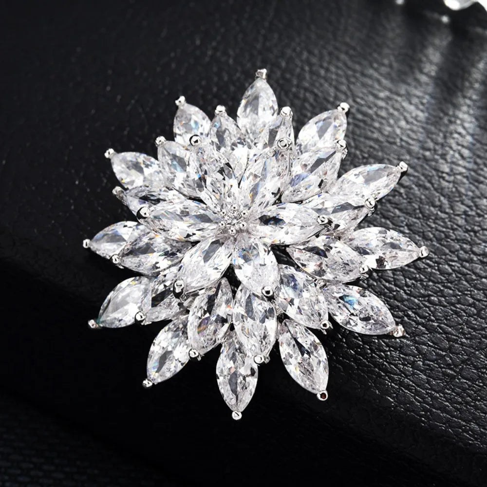 Sparkling crystal brooch on a dark background