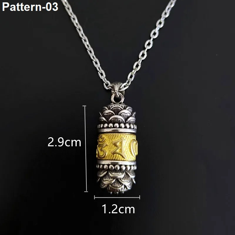 Silver and gold pendant necklace with measurements on a black background