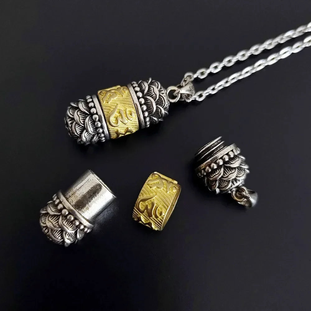 Silver and gold jewelry components on a black background