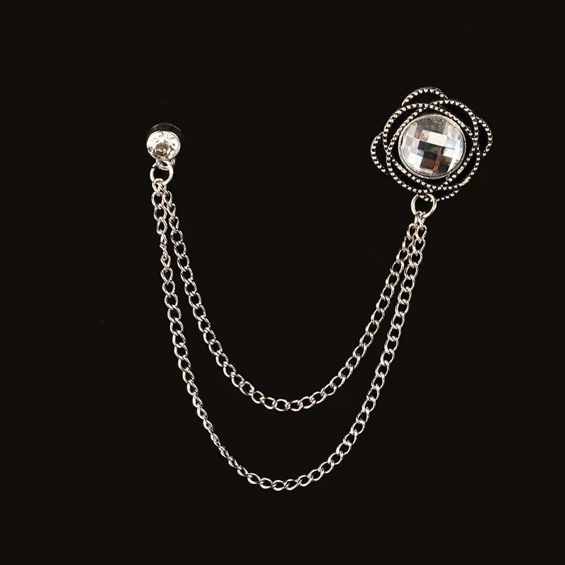 Silver chain brooch with round faceted crystal gemstone design