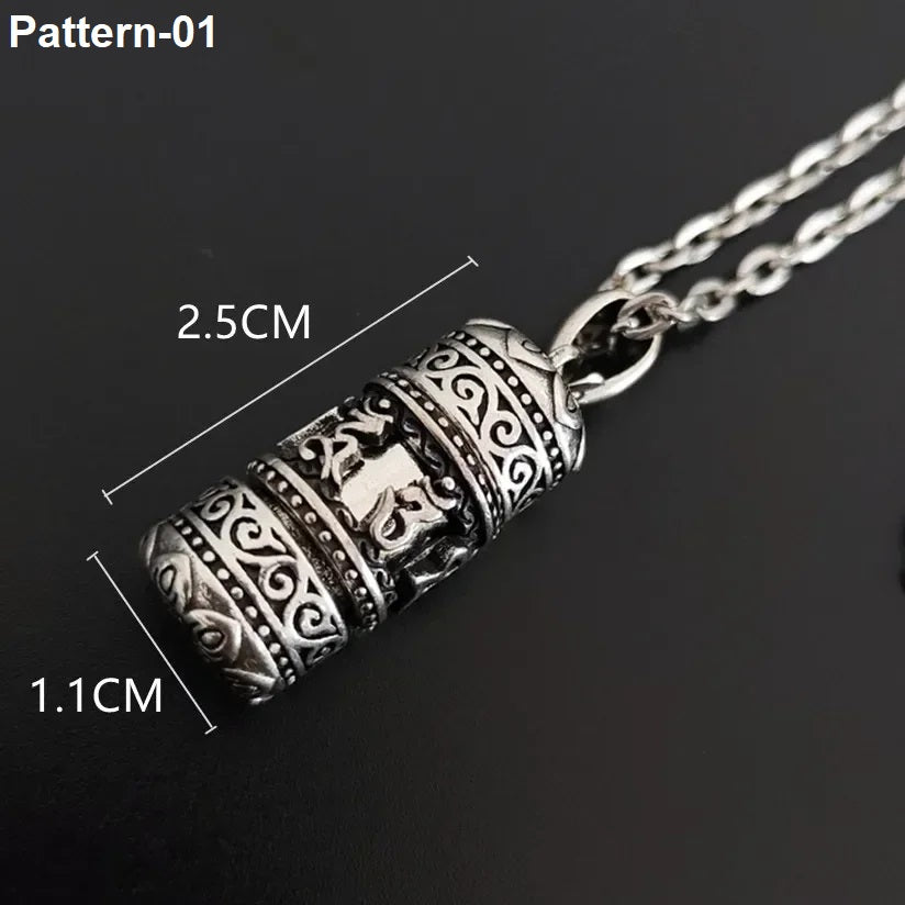 Silver pendant necklace with measurements on a black background