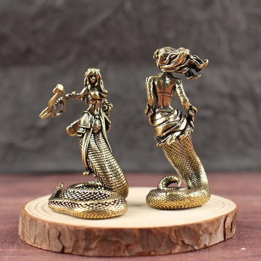 Vintage brass Medusa statue front and back view on wooden display stand