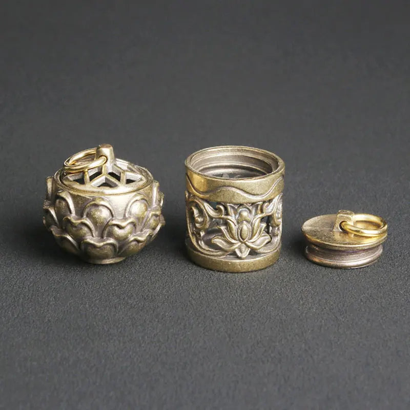 Vintage brass openable pendant box with removable lid and lotus aroma charm design