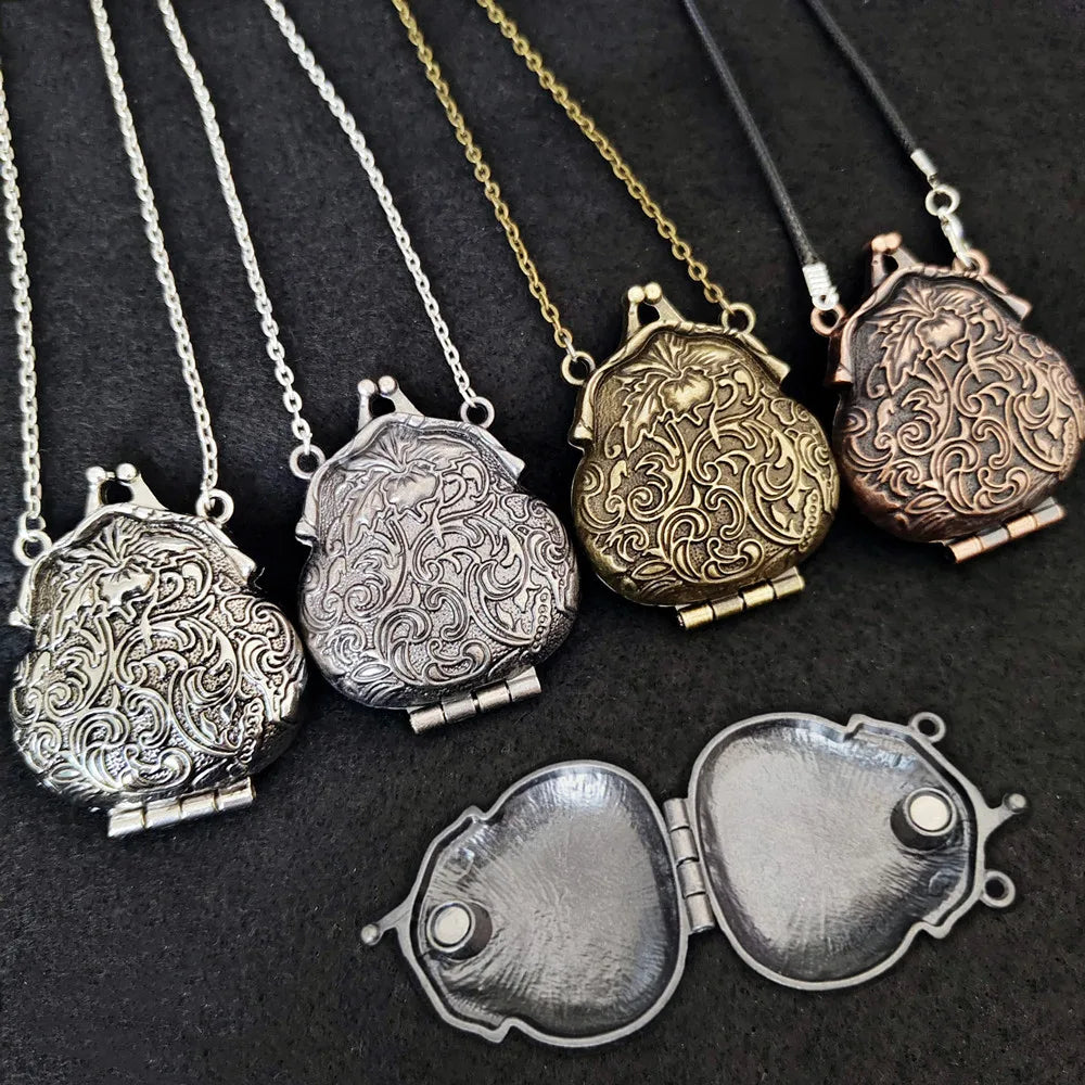 Collection of ornate locket necklaces in various colors on a dark background