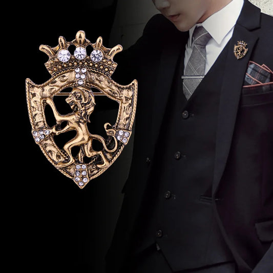 Man wearing formal suit with luxury lion crown brooch accessory
