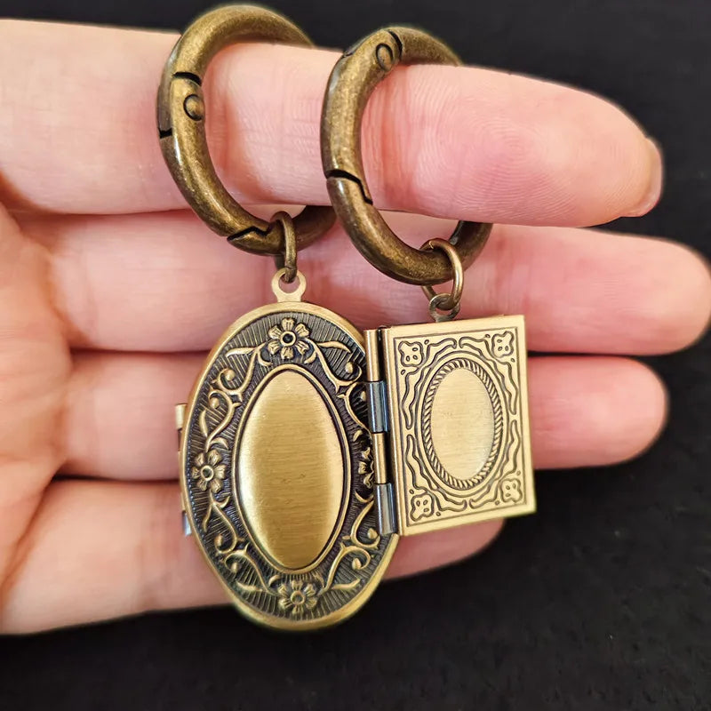 Antique oval photo locket keychain with floral engraved design